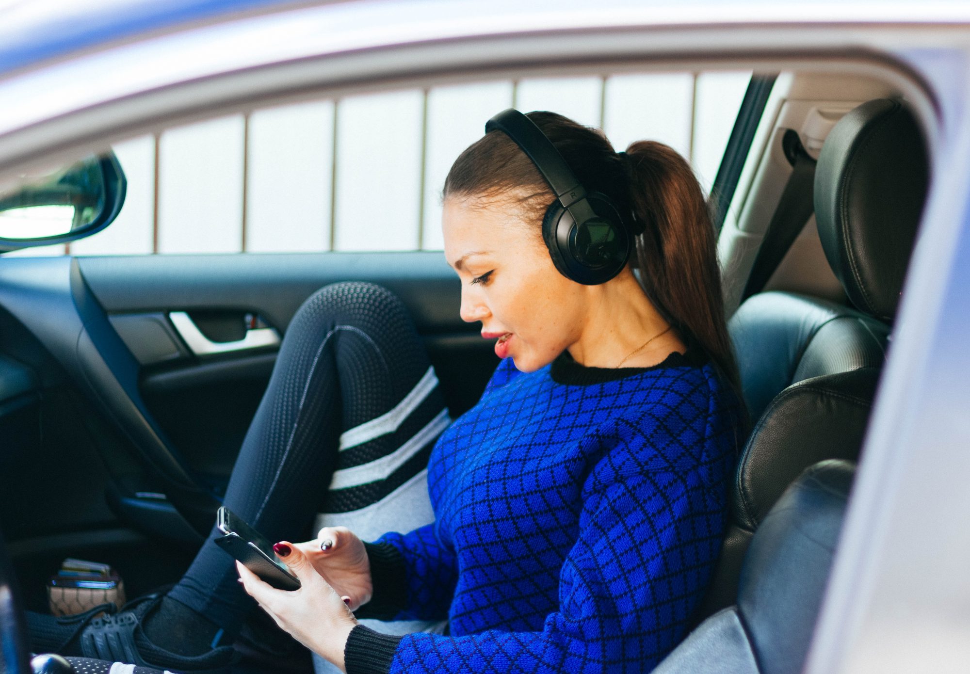 girl-in-car-with-headphones