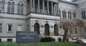 image of the Carnegie Library of Pittsburgh https://en.wikipedia.org/wiki/Carnegie_Library_of_Pittsburgh#/media/File:CarnegieLibraryPittsburghFrontEntrance.jpg