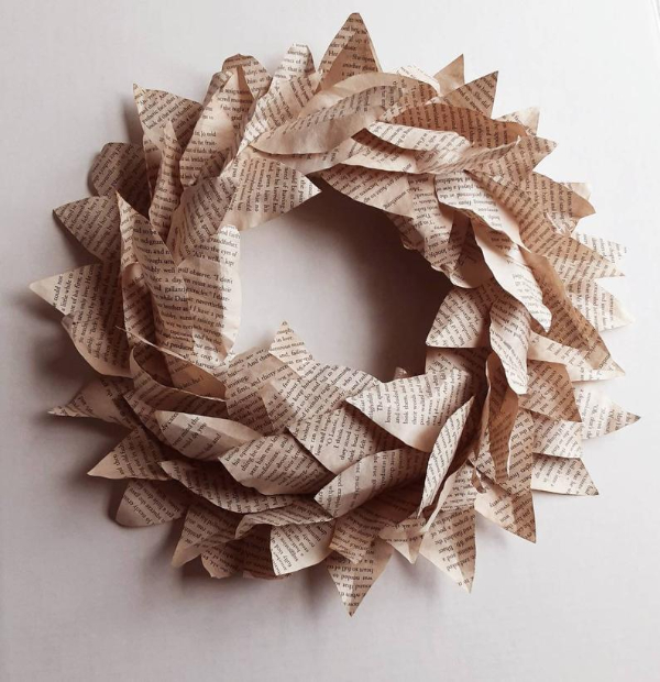 Picture of wreath made from book pages cut in the shape of magnolia leaves