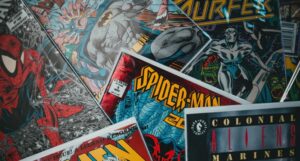 image of several comic books in a messy pile https://unsplash.com/photos/8SeJUmfahu0
