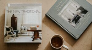 Image of coffee table books and cup of coffee