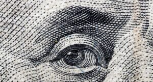 Close up of Ben Franklin's eye from money
