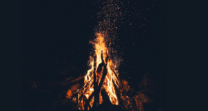 a photo of a bonfire in the dark
