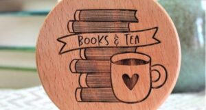 coaster that says "books and tea"