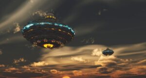 two futuristic looking spaceships floating in a sky at sunset