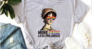 a tshirt with a graphic of Jane Austen wearing rainbow sunglasses and text saying More Pride Less Prejucide
