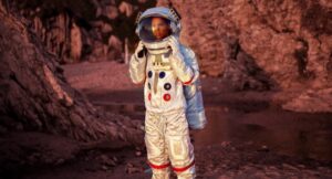 brown-skinned person in an astronaut suit