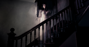 a photo of a ghost woman on stairs