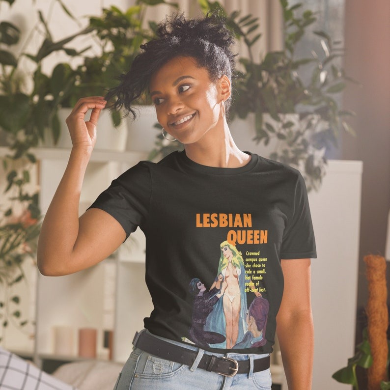 a person wearing a shirt with the cover of Lesbian Queen