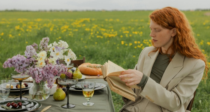 red-headed woman reading