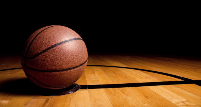 a basketball on an empty court