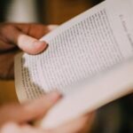 hands holding a book