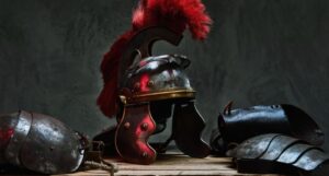 armor of ancient greek soldier on a wood table against dark gray background