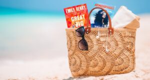 a beach bag with Great Big Beautiful Life and Atmosphere sticking out