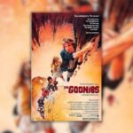 poster for the movie The Goonies showing the kids from the movie holding onto a rope