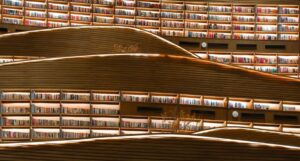 curved shelves filled with books