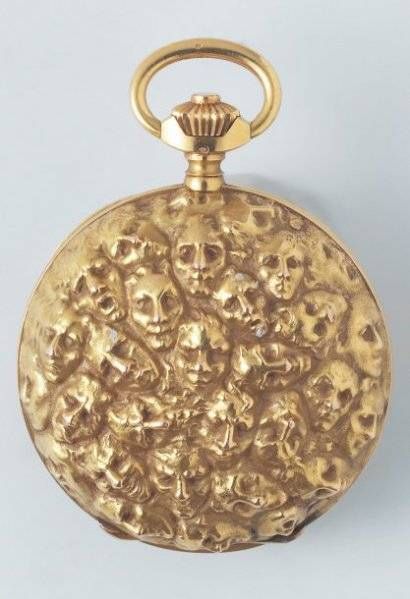 Gold pocket watch by Lalique