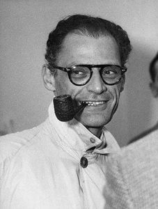 American Playwright Arthur Miller Smoking a Pipe