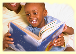 boy reading with parent