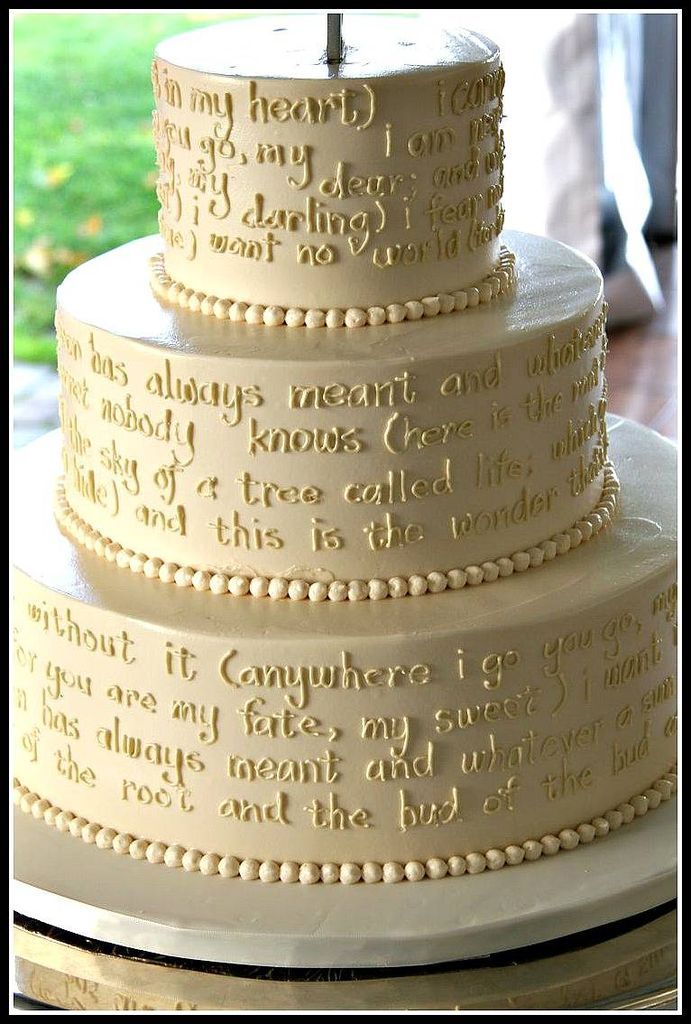wedding cake with a hand piped poem by ee cummings 'i carry your heart'. done by 'Bella e Dolce', northern Michigan area bakery