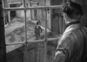 Great Expectations 1946 - Pip loks down at Joe