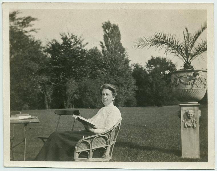 Woman reading a book outside