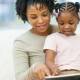 Mom reading to daughter