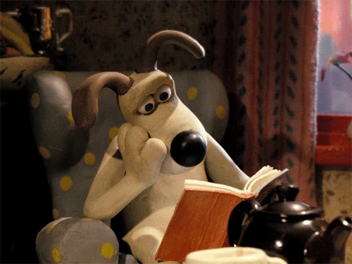 grommit reading a book