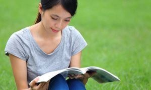 asian woman reading