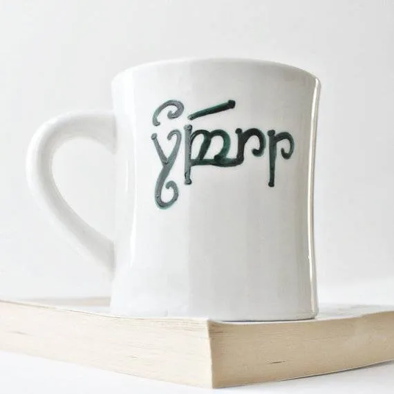 This Etsy seller will paint your name on a mug in elvish. (Don't ask me which elvish, though.)