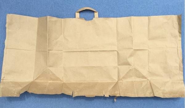 How to make a book cover from a paper grocery Sack. — Ross