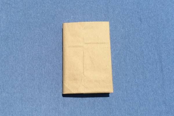 How to make a book cover from a paper grocery Sack. — Ross