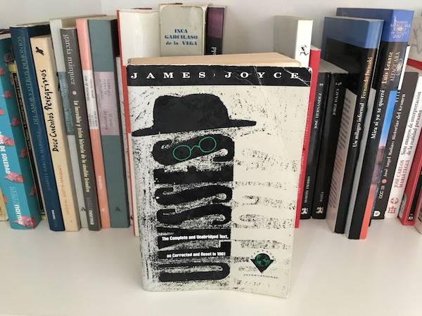 Copy of Ulysses by James Joyce on a bookshelf.