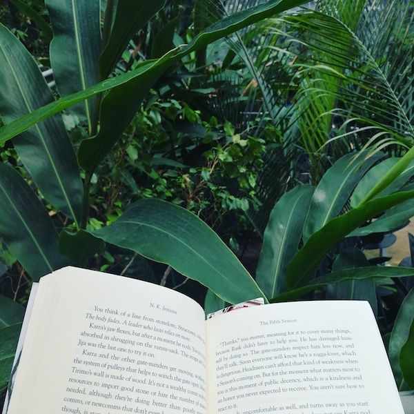 Reading in the Cloud Gardens Conservatory in downtown Toronto.