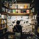 Image of a girl in a bookstore for post about literary tourism in buffalo, new york