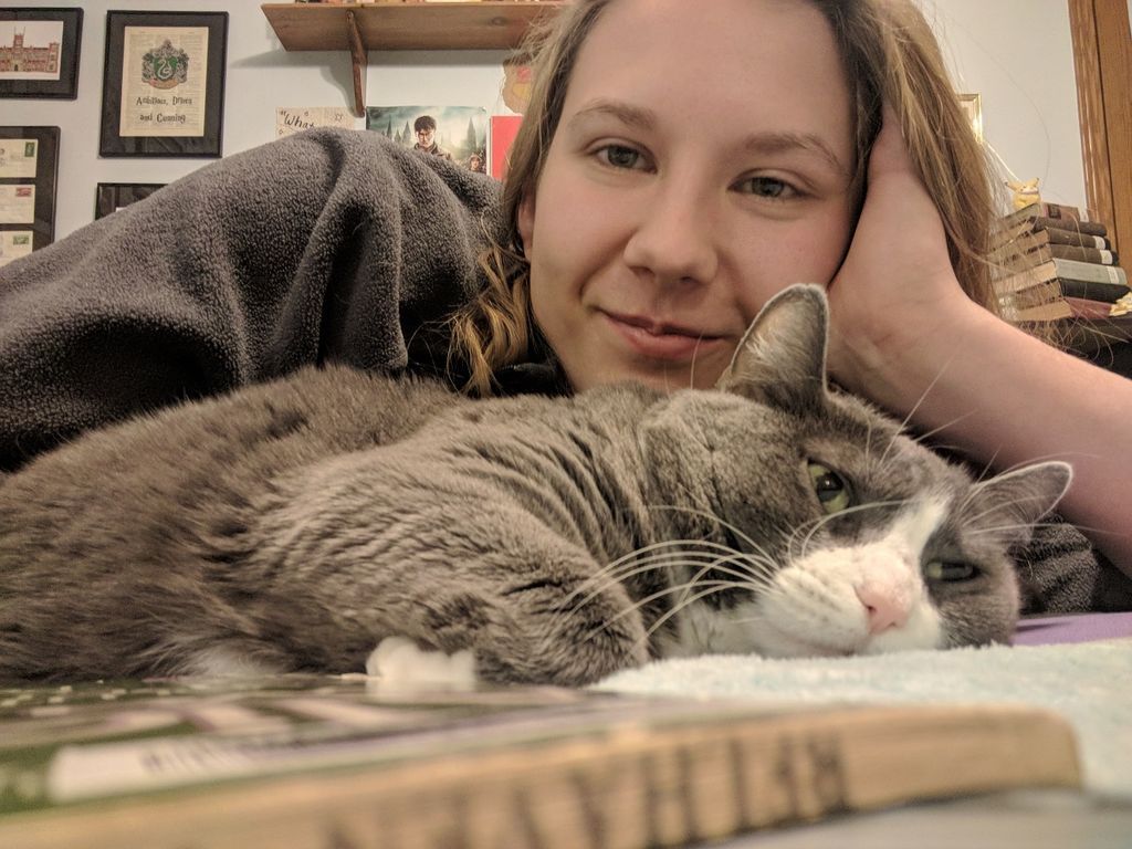 Reading books with my cat