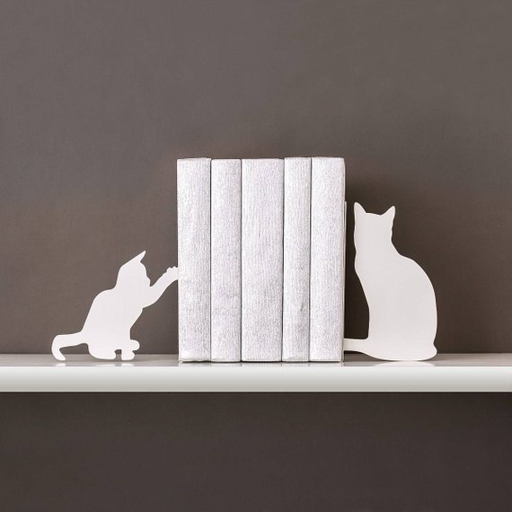Cat Bookends To Make Your Bookshelves Look Purrfect | Book Riot