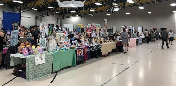 Comic creators and artists exhibit their wares at tables for Staple! in Austin