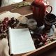 Photo of a book on a tray with tea and sugar
