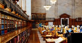 Photo of tables and books at a New York public library