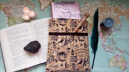 Ouija board themed book sleeve