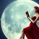 woman reading in front of moon feature 470x248