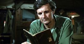 Alan Alda reading MASH memoirs feature