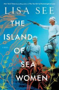 The Island of Sea Women cover - blue background with two women divers