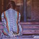 non-readers back turned solitary woman avoiding book feature