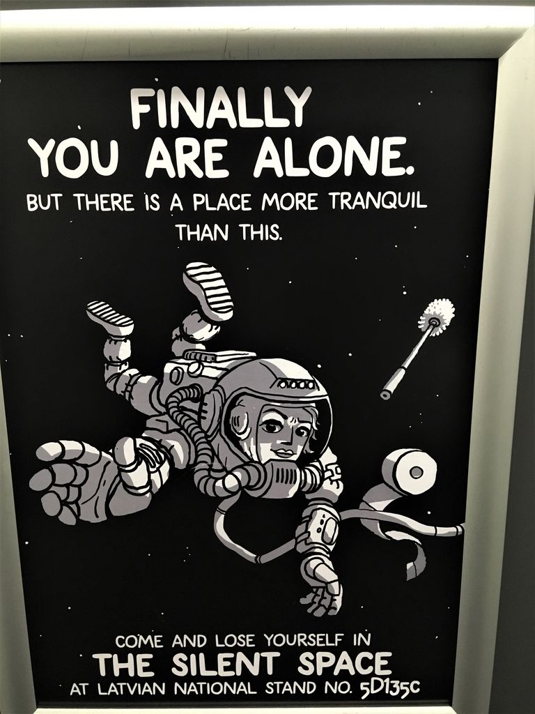 black poster featuring an astronaut, a toilet cleaning brush, and toilet paper, reading "Finally you are alone"