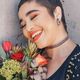woman with flowers feature