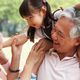 grandparents with granddaughter feature