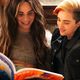 trans couple reading colorful book queer lgbtq feature
