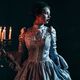 victorian woman holding candelabra historical fiction mystery thriller and crime feature